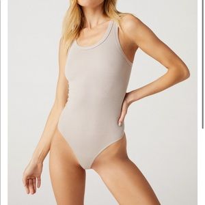Clyque the Label bodysuit in XS in tan color.